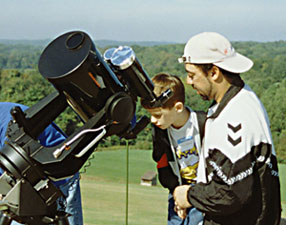 My son Ryan and I looking at H-Alpha flares on the Sun